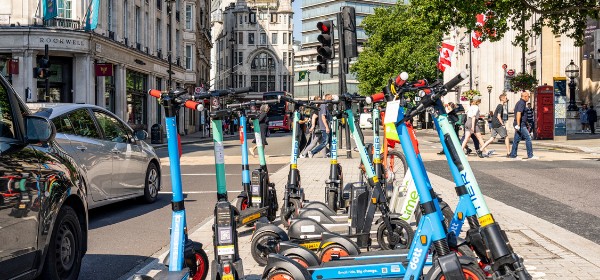 E-scooters parked on city street